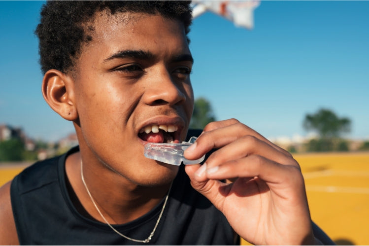 Adult with mouth guard